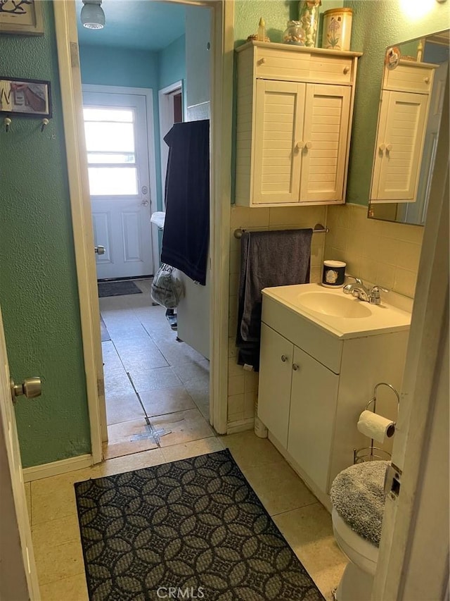 1017 Avenida De Pio Pico, Placentia, CA 92870 - bathroom featuring vanity, toilet, tile patterned flooring, and a textured wall