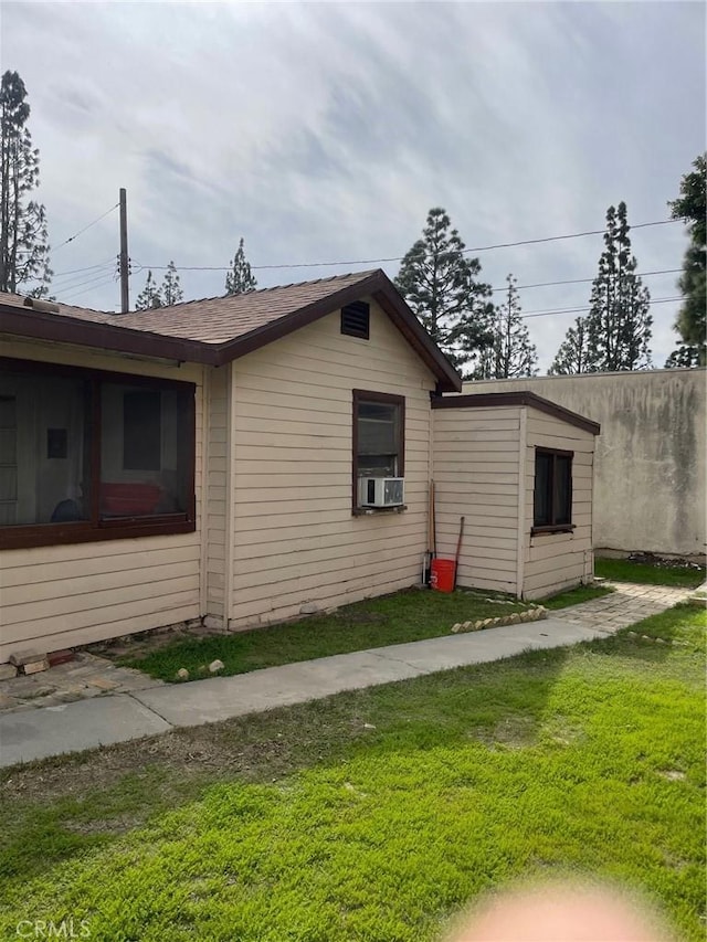 1017 Avenida De Pio Pico, Placentia, CA 92870 - view of side of home featuring a lawn and cooling unit