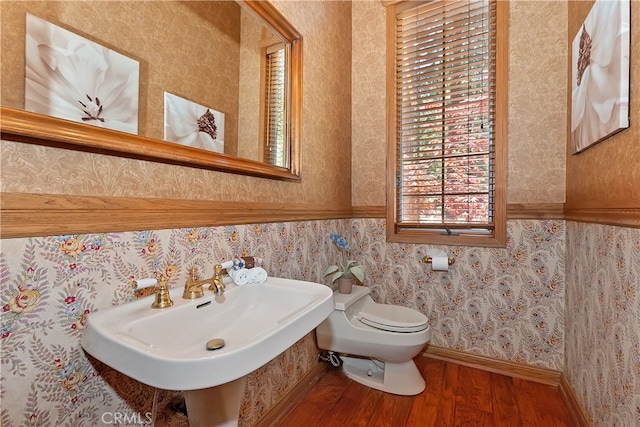 531 Killington Way, Big Bear Lake, CA 92315 - half bathroom with wood finished floors, toilet, wallpapered walls, and a sink