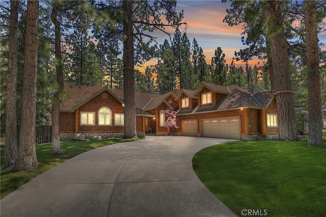 531 Killington Way, Big Bear Lake, CA 92315 - view of front of home with concrete driveway, a front yard, and a garage