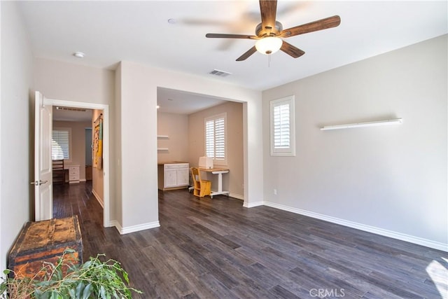 45668 Nora Cir, Temecula, CA 92592 - living room with a ceiling fan, healthy amount of natural light, dark wood-style floors, and baseboards