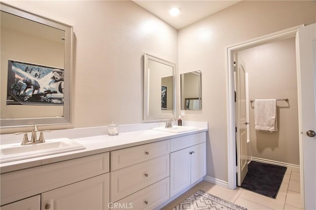 45668 Nora Cir, Temecula, CA 92592 - bathroom featuring double vanity, tile patterned floors, and baseboards