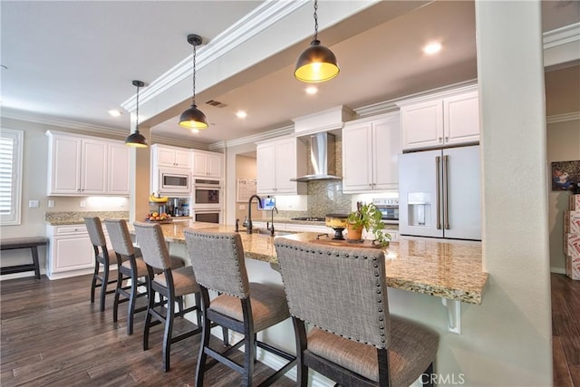 45668 Nora Cir, Temecula, CA 92592 - kitchen with wall chimney range hood, a sink, high end white fridge, ornamental molding, and double wall oven