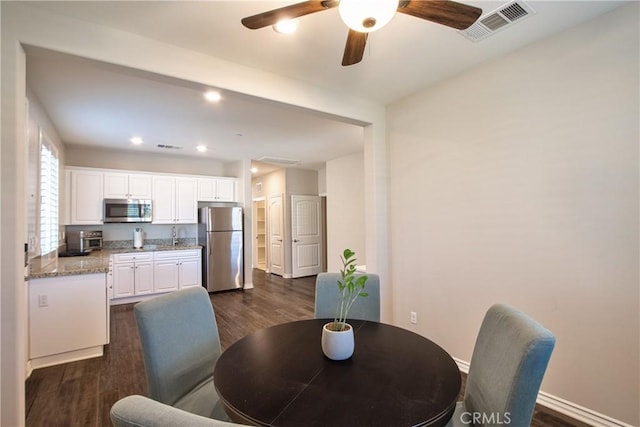 45668 Nora Cir, Temecula, CA 92592 - dining room featuring dark wood-style floors, ceiling fan, baseboards, and recessed lighting
