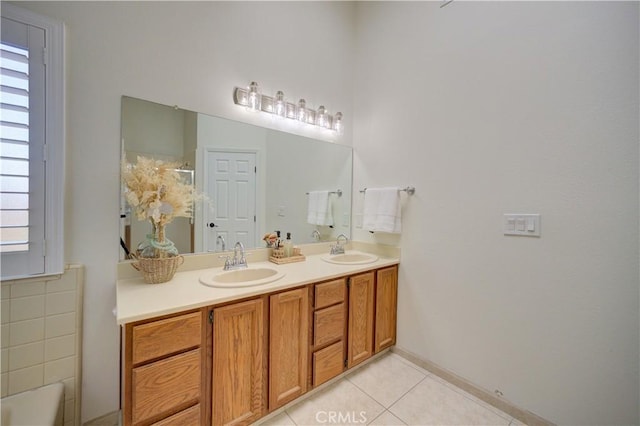 6456 Twinberry Cir, Avila Beach, CA 93424 - bathroom featuring double vanity, tile patterned flooring, a bathtub, baseboards, and a shower