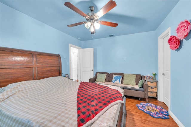 2500 E Walnut Creek Pkwy, West Covina, CA 91791 - bedroom featuring wood finished floors, a ceiling fan, and baseboards