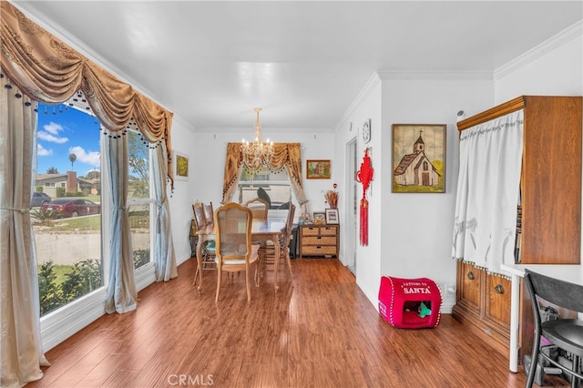 2500 E Walnut Creek Pkwy, West Covina, CA 91791 - dining area featuring a chandelier, wood finished floors, and ornamental molding