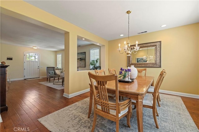 26520 Thackery Ln, Stevenson Ranch, CA 91381 - dining space with a chandelier, wood finished floors, and recessed lighting