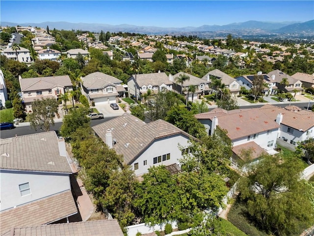 26520 Thackery Ln, Stevenson Ranch, CA 91381 - aerial view of residential area featuring a mountainous background