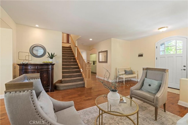 26520 Thackery Ln, Stevenson Ranch, CA 91381 - living area featuring stairs, wood finished floors, and recessed lighting