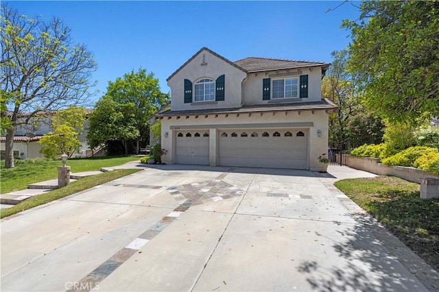 26520 Thackery Ln, Stevenson Ranch, CA 91381 - traditional-style home featuring an attached garage, stucco siding, concrete driveway, and a front yard