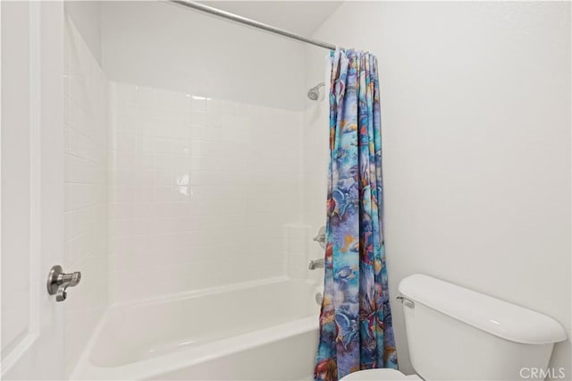 26520 Thackery Ln, Stevenson Ranch, CA 91381 - bathroom featuring toilet and shower / bathtub combination with curtain