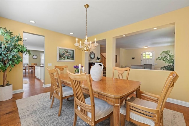26520 Thackery Ln, Stevenson Ranch, CA 91381 - dining space featuring a chandelier, wood finished floors, and recessed lighting