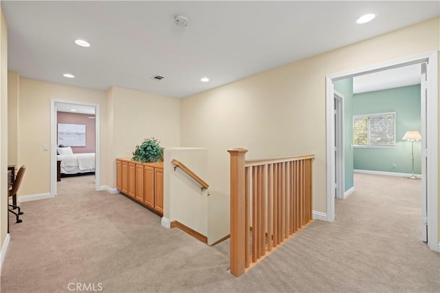 26520 Thackery Ln, Stevenson Ranch, CA 91381 - hall with an upstairs landing, light colored carpet, and recessed lighting