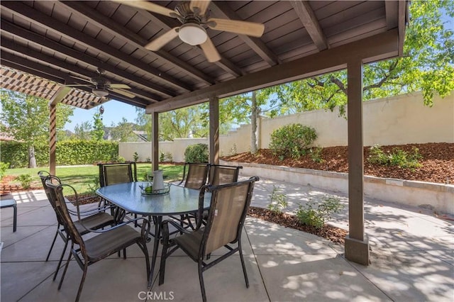 26520 Thackery Ln, Stevenson Ranch, CA 91381 - fenced backyard featuring ceiling fan, outdoor dining space, and a patio area