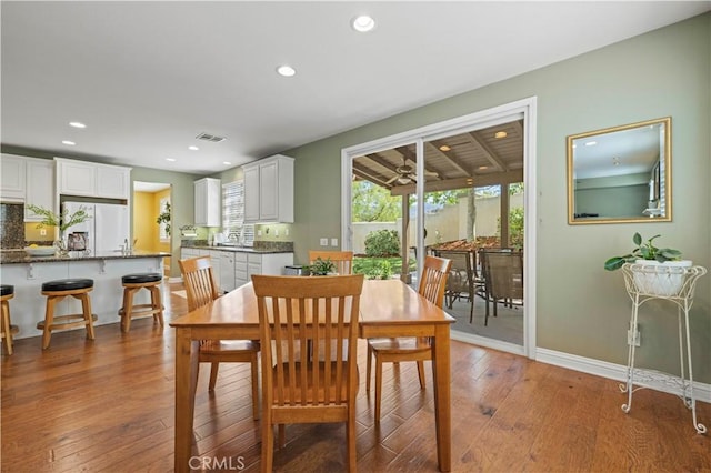 26520 Thackery Ln, Stevenson Ranch, CA 91381 - dining area featuring hardwood / wood-style flooring and recessed lighting