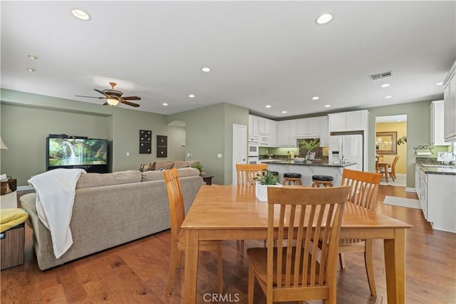 26520 Thackery Ln, Stevenson Ranch, CA 91381 - dining area with wood finished floors, recessed lighting, and ceiling fan