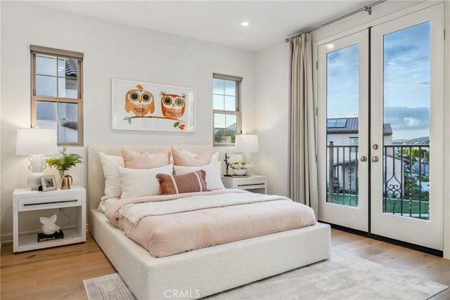 200 Canterbury, Irvine, CA 92618 - bedroom with access to outside, light wood-style floors, recessed lighting, and french doors