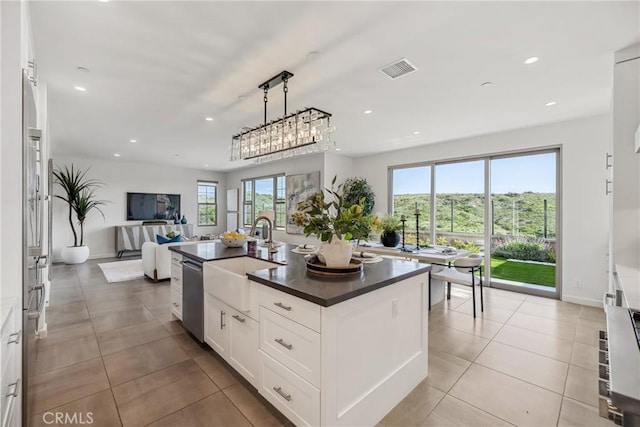 200 Canterbury, Irvine, CA 92618 - kitchen with a sink, stainless steel dishwasher, dark countertops, healthy amount of natural light, and recessed lighting