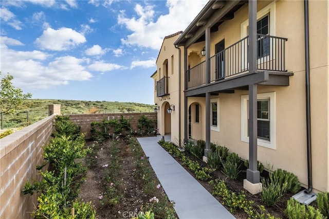 200 Canterbury, Irvine, CA 92618 - view of property exterior with stucco siding and a balcony