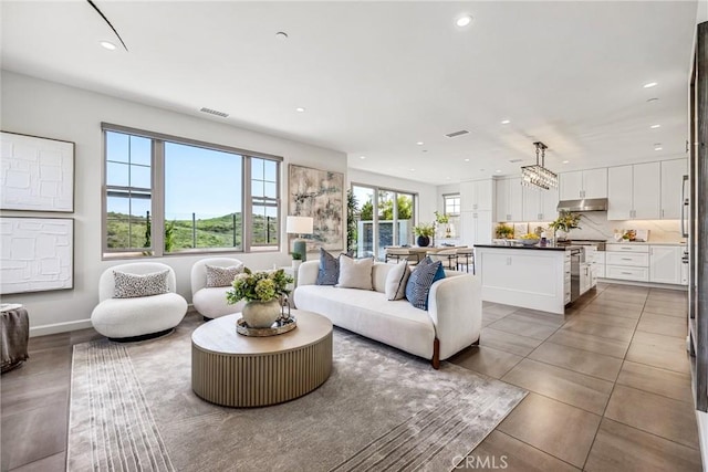 200 Canterbury, Irvine, CA 92618 - living area featuring recessed lighting and baseboards