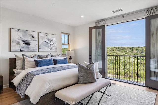 200 Canterbury, Irvine, CA 92618 - bedroom featuring wood finished floors, access to exterior, and recessed lighting