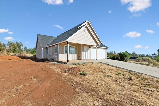 1325 Deodara Way, Paradise, CA 95969 - ranch-style house with driveway, a garage, board and batten siding, and covered porch