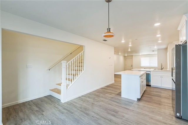 1325 Deodara Way, Paradise, CA 95969 - kitchen with appliances with stainless steel finishes, a sink, light wood-type flooring, light countertops, and recessed lighting