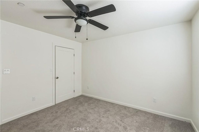 1325 Deodara Way, Paradise, CA 95969 - empty room with light carpet, baseboards, and a ceiling fan
