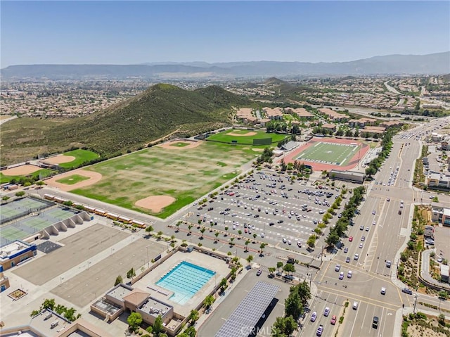 36702 Doreen Dr, Murrieta, CA 92563 - drone / aerial view of a mountain backdrop and a pool area