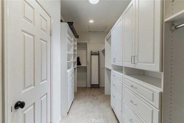 36702 Doreen Dr, Murrieta, CA 92563 - spacious closet featuring attic access and light carpet