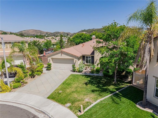 36702 Doreen Dr, Murrieta, CA 92563 - view of front facade with stucco siding, concrete driveway, a tiled roof, a garage, and a front yard