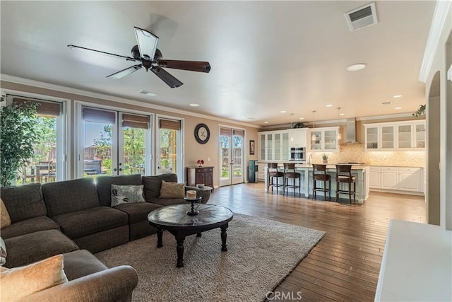 36702 Doreen Dr, Murrieta, CA 92563 - living area with ornamental molding, light wood-style floors, ceiling fan, and recessed lighting