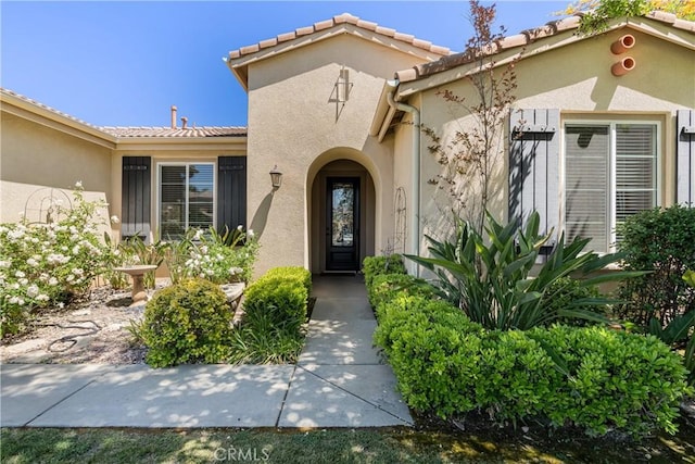 36702 Doreen Dr, Murrieta, CA 92563 - doorway to property with stucco siding and a tile roof