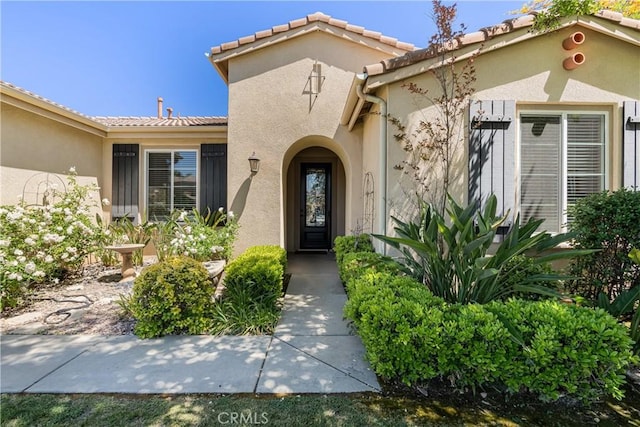 36702 Doreen Dr, Murrieta, CA 92563 - doorway to property featuring stucco siding and a tile roof