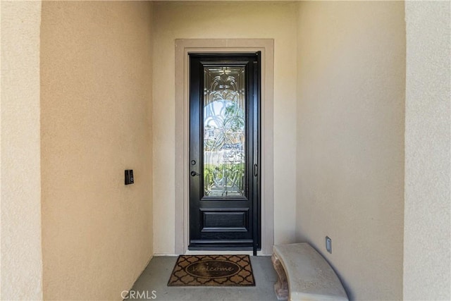 36702 Doreen Dr, Murrieta, CA 92563 - doorway to property featuring stucco siding