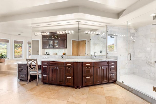 9698 Welk View Dr, Escondido, CA 92026 - full bathroom featuring double vanity, a stall shower, tile patterned floors, and backsplash