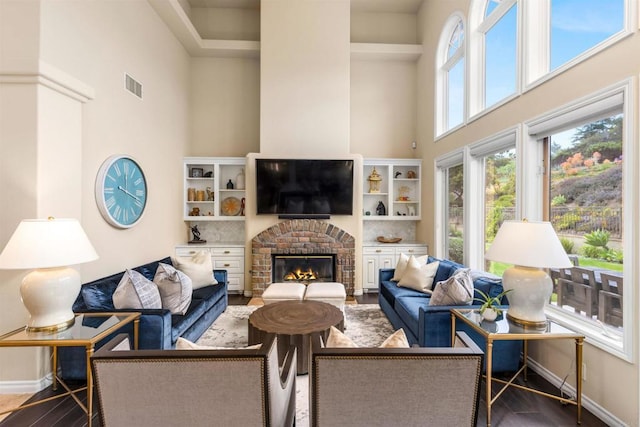 9698 Welk View Dr, Escondido, CA 92026 - living room with a towering ceiling, wood finished floors, and a fireplace
