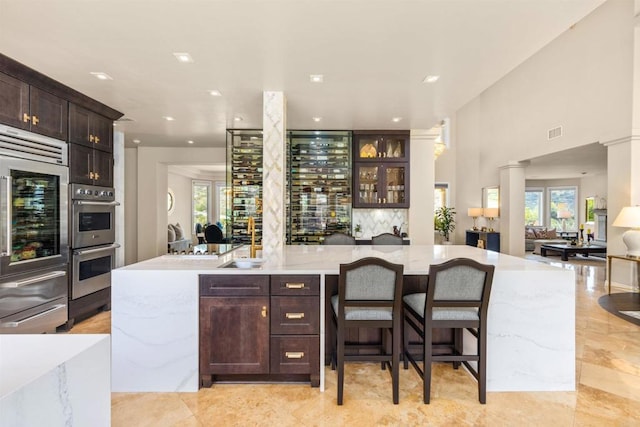 9698 Welk View Dr, Escondido, CA 92026 - indoor bar with double oven, fridge, healthy amount of natural light, and recessed lighting