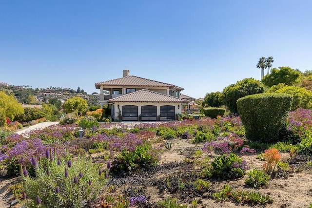 9698 Welk View Dr, Escondido, CA 92026 - back of house featuring a tiled roof, a chimney, and a sunroom