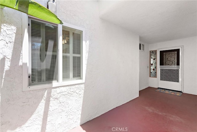 27972 Via Chocano, Mission Viejo, CA 92692 - property entrance featuring a patio and stucco siding