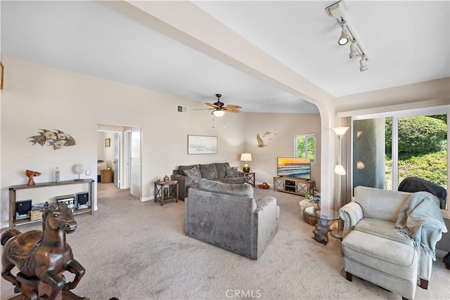 27972 Via Chocano, Mission Viejo, CA 92692 - living area featuring carpet, ceiling fan, rail lighting, and arched walkways