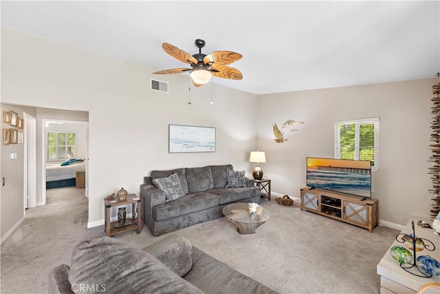 27972 Via Chocano, Mission Viejo, CA 92692 - carpeted living room featuring a ceiling fan, plenty of natural light, and baseboards