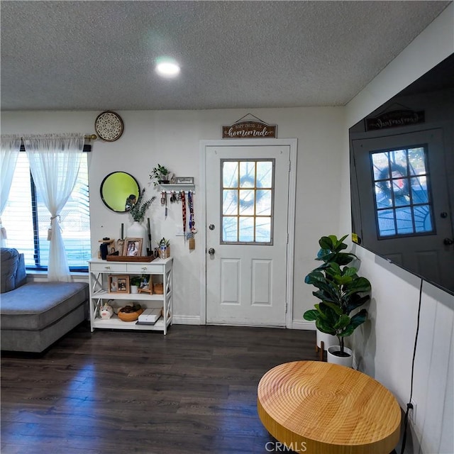 9754 5th Ave, Hesperia, CA 92345 - foyer with a textured ceiling, healthy amount of natural light, wood finished floors, and recessed lighting