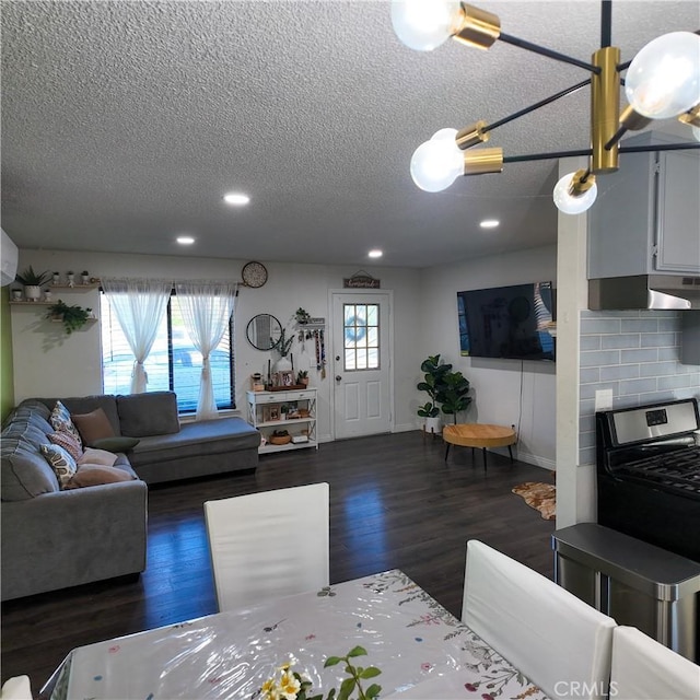 9754 5th Ave, Hesperia, CA 92345 - living area featuring a textured ceiling, dark wood-type flooring, recessed lighting, and baseboards
