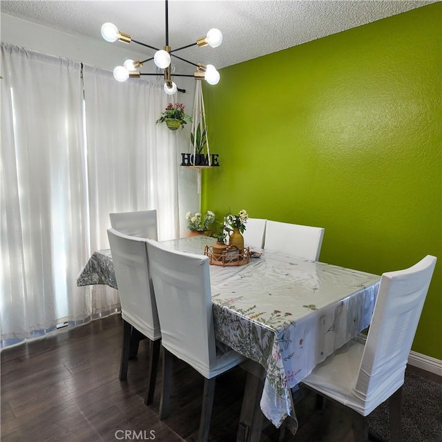 9754 5th Ave, Hesperia, CA 92345 - dining space featuring a chandelier, wood finished floors, and a textured ceiling