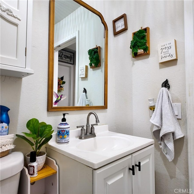 9754 5th Ave, Hesperia, CA 92345 - bathroom with vanity and toilet