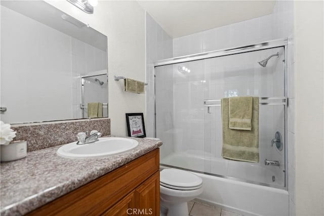 2300 S Hacienda Blvd Unit F8, Hacienda Heights, CA 91745 - bathroom featuring vanity, toilet, enclosed tub / shower combo, and tile patterned flooring