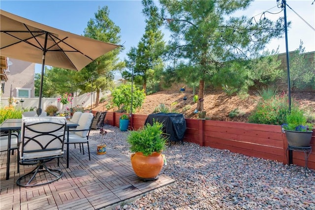 10460 Meadow Lark Ave, Moreno Valley, CA 92557 - fenced backyard featuring grilling area, a patio area, and outdoor dining area