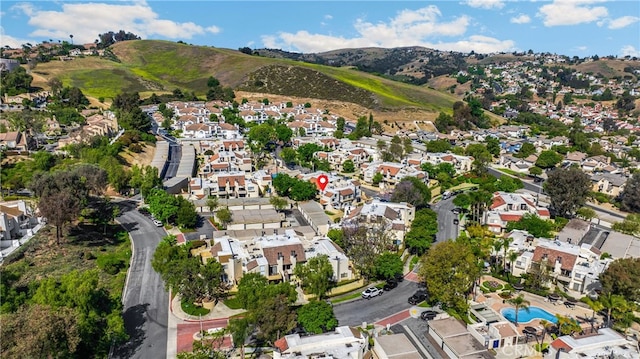 13115 Le Parc, Chino Hills, CA 91709 - aerial view of property and surrounding area featuring nearby suburban area, a mountainous background, and a pool area